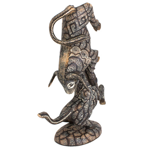 Two Bulls Fighting, Copal Wood