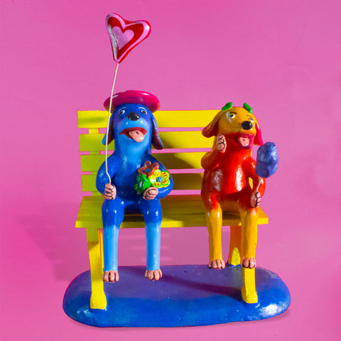 Dog Lovers sitting on a bench, Betus Clay