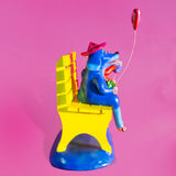 Dog Lovers sitting on a bench, Betus Clay