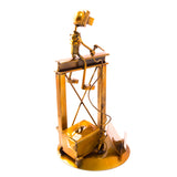 Welder Over a Structure, Recycled Metal