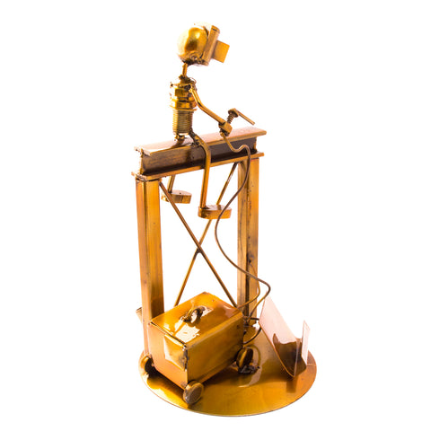 Welder Over a Structure, Recycled Metal