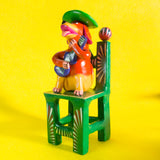 Dog Sitting on a Chair with his Guitar, Betus Clay