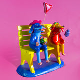 Dog Lovers sitting on a bench, Betus Clay